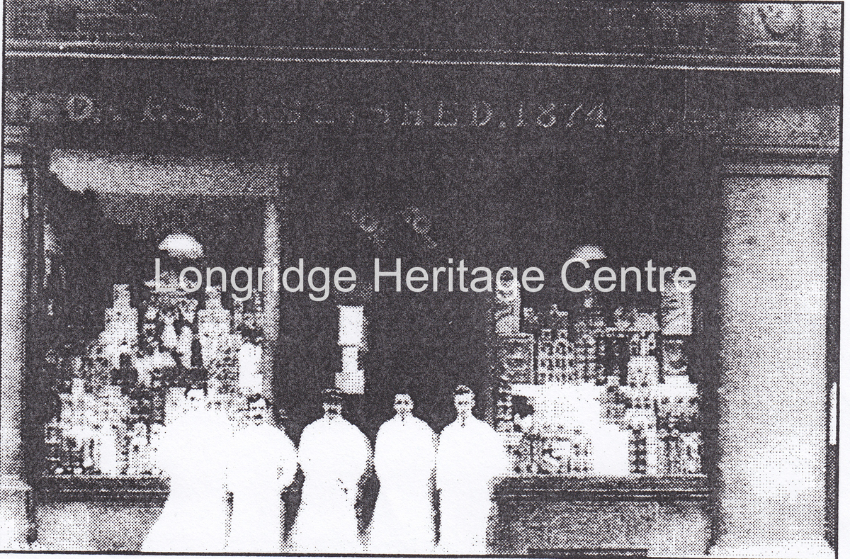 891 - Co-op building - Group of employees outside main building - Unknown